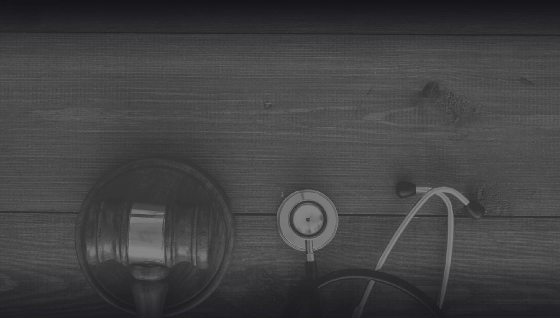 A black and white photo of a judge 's gavel.